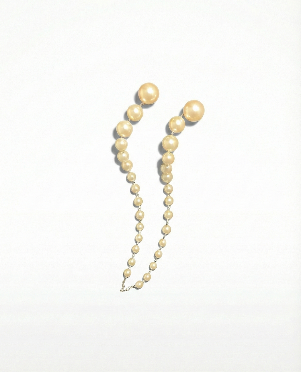 Pearl necklace on a white background