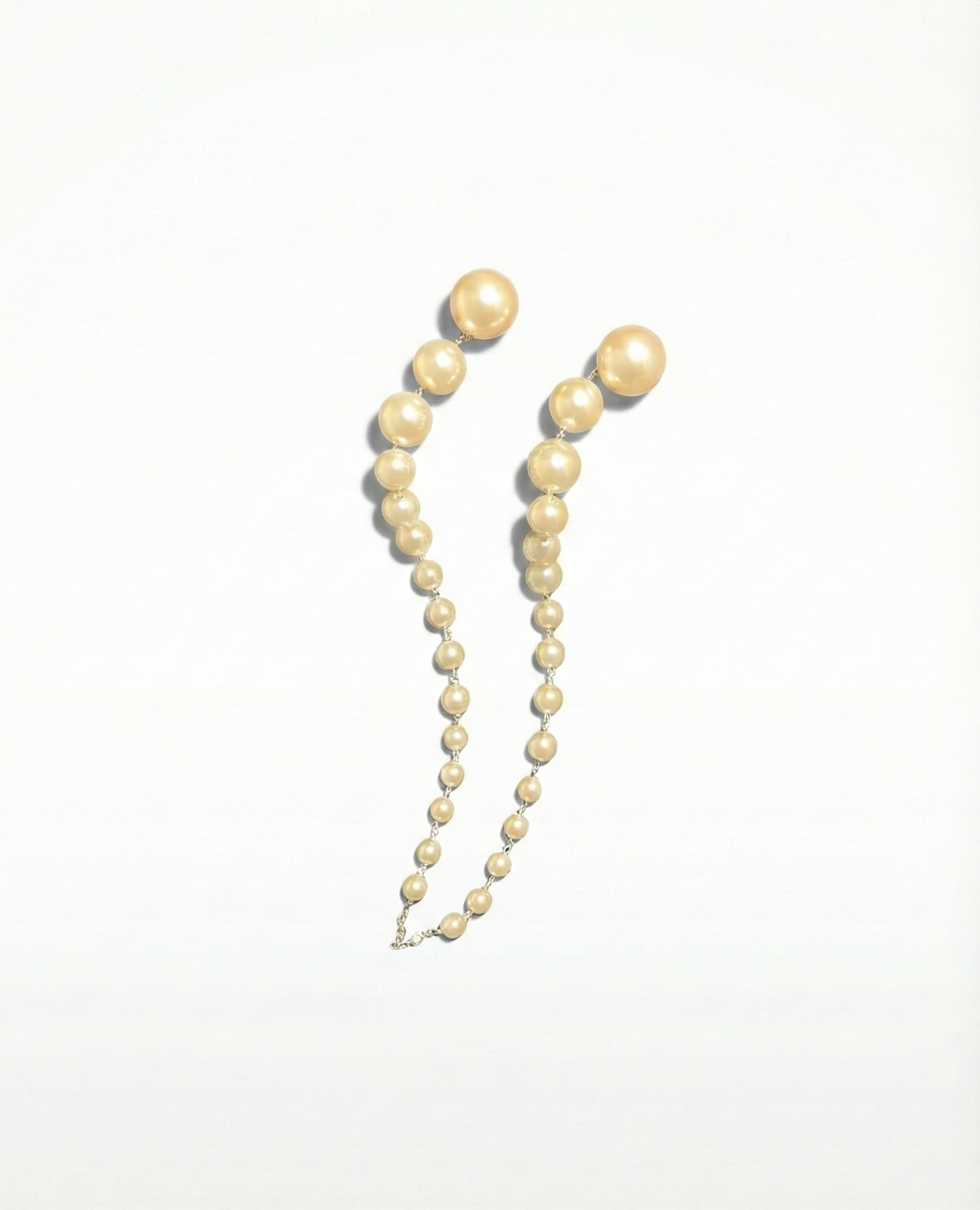 Pearl necklace on a white background