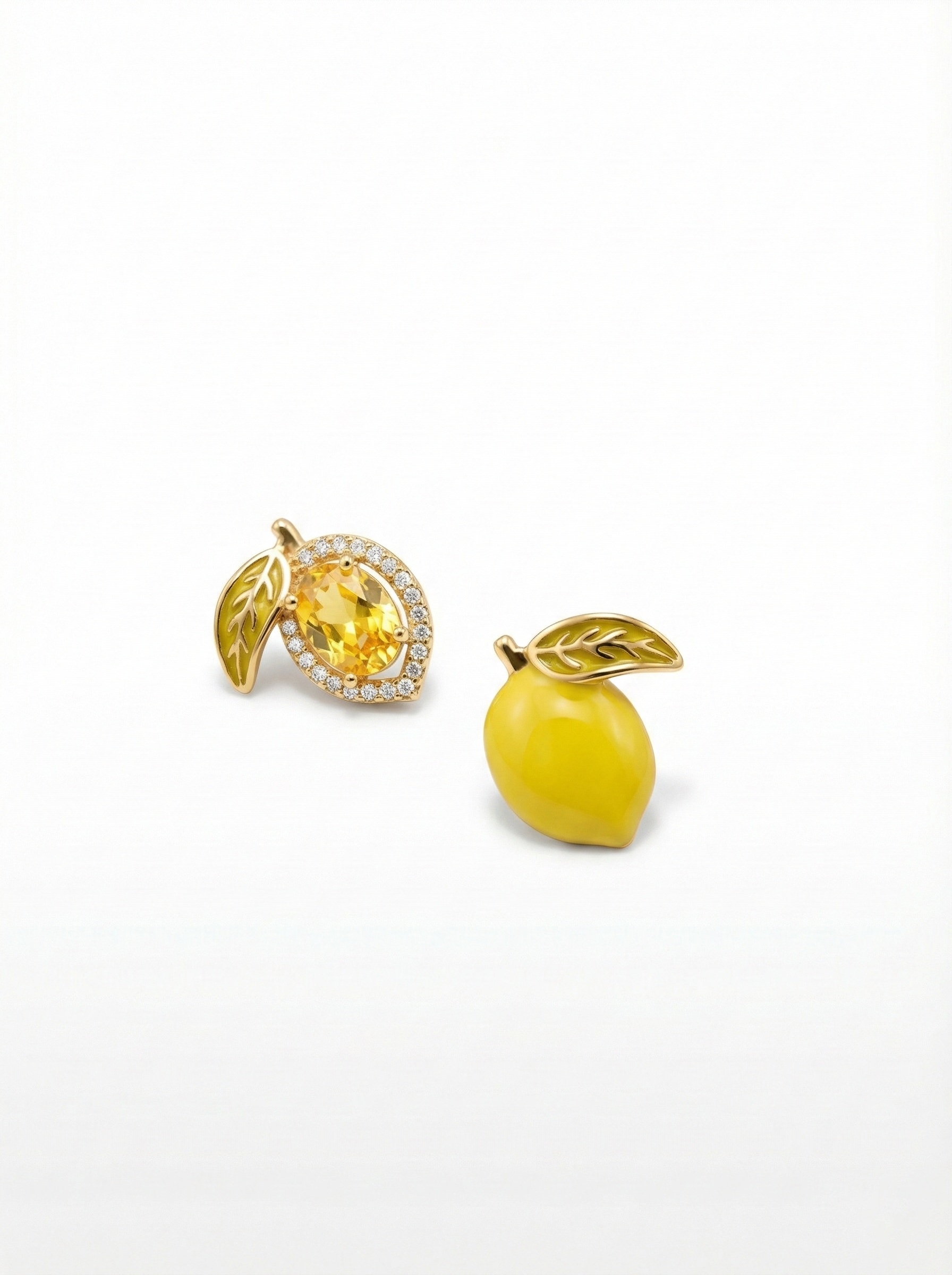 Two yellow earrings on a white background