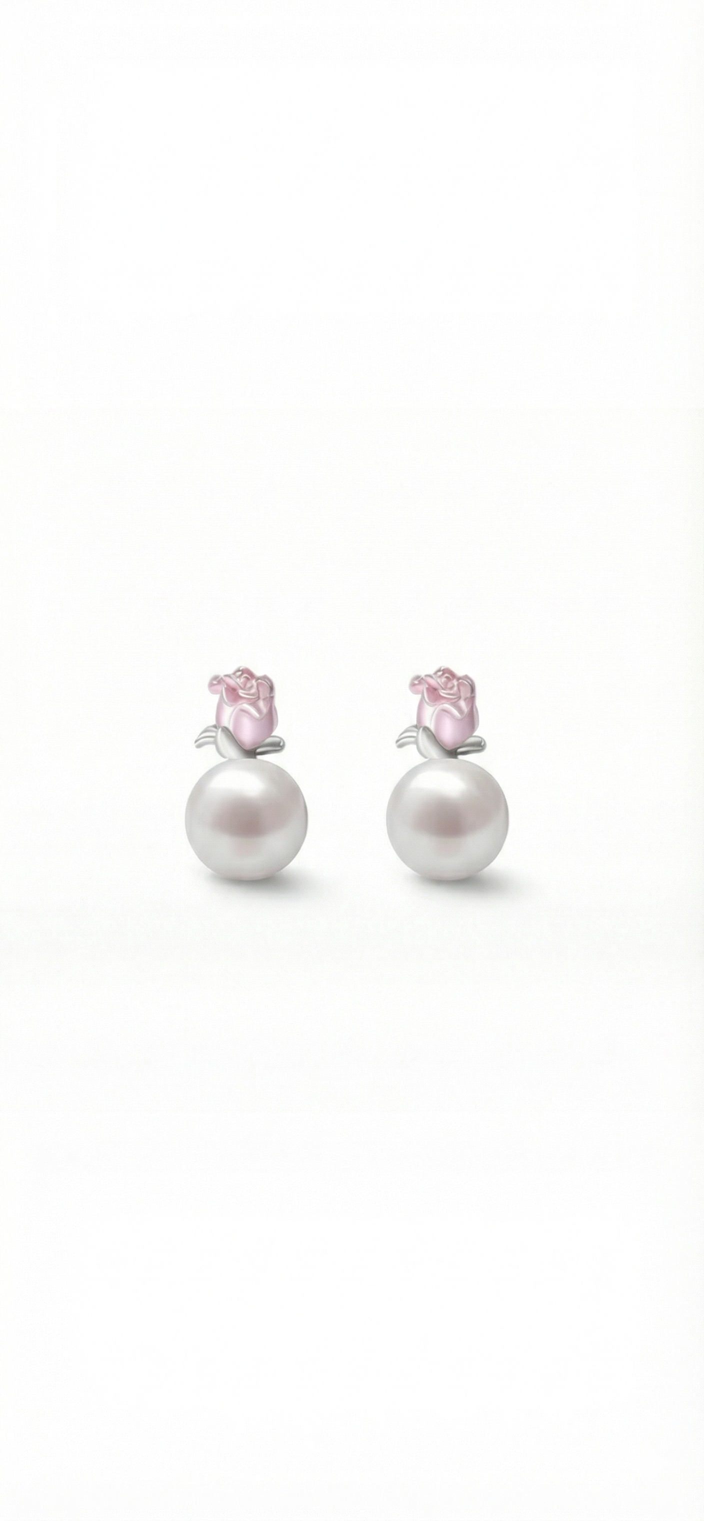 Pair of pearl earrings with pink gemstones on a white background